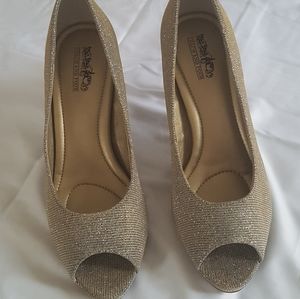 Classy Coach and four High heels size 8